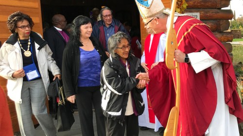 Mark Lattime shakes hands